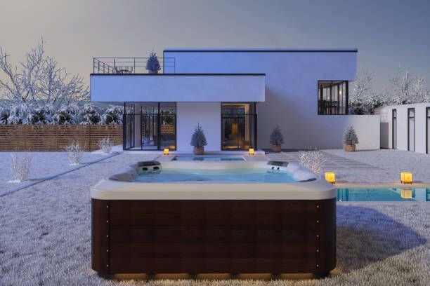 exterior-of-luxurious-modern-villa-with-hot-tub-and-swimming-pool-in-winter1480963675036780064.jpg