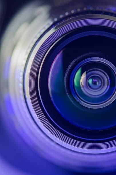 the-camera-lens-and-light-blue-vertical-photo2733668334711019677.jpg