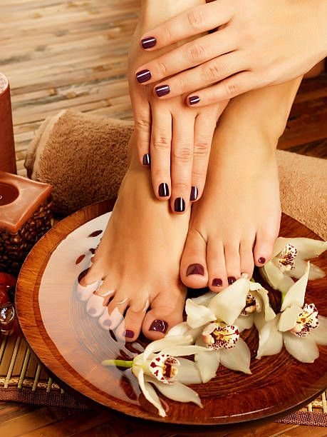 womans-hands-and-feet-after-a-manicure-and-pedicure-at-dos5572983348858391468.jpg